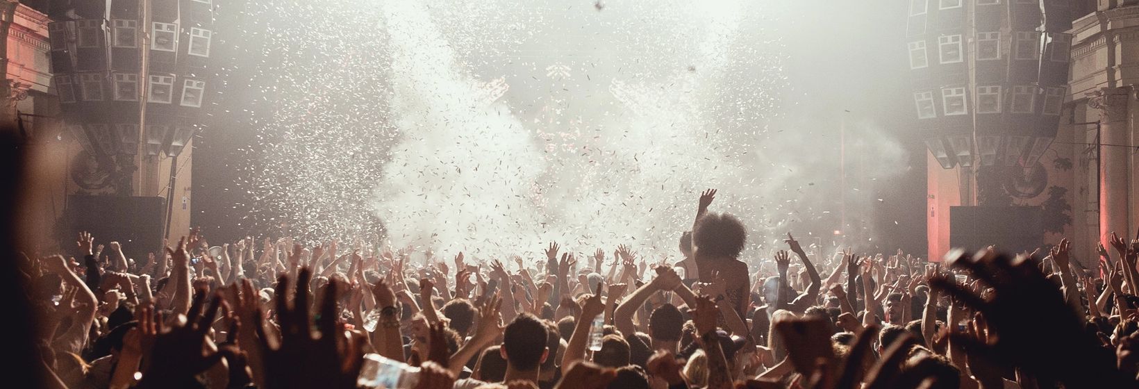 Crowd at a live concert with confetti